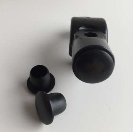 Acoperire pentru orificiul oglinzii.